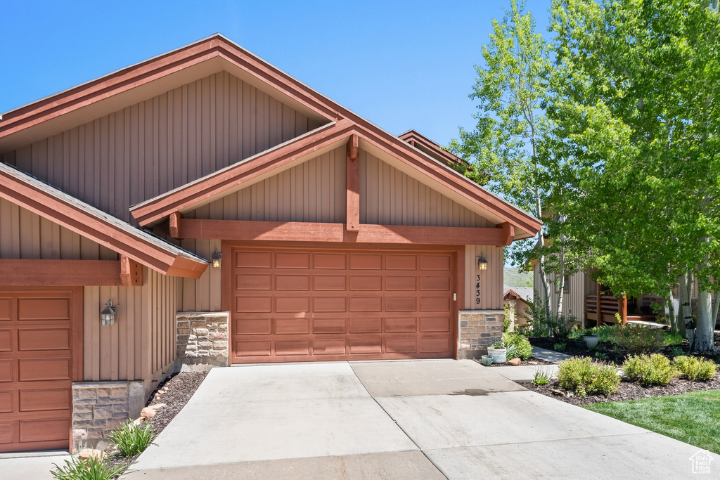 Craftsman-style house featuring a garage