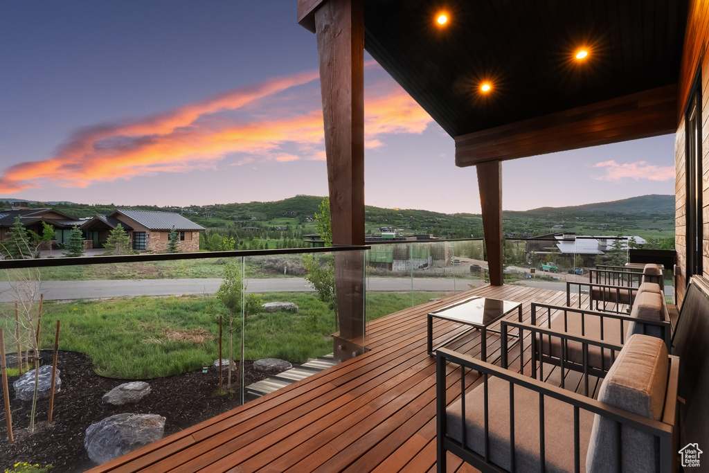 View of deck at dusk