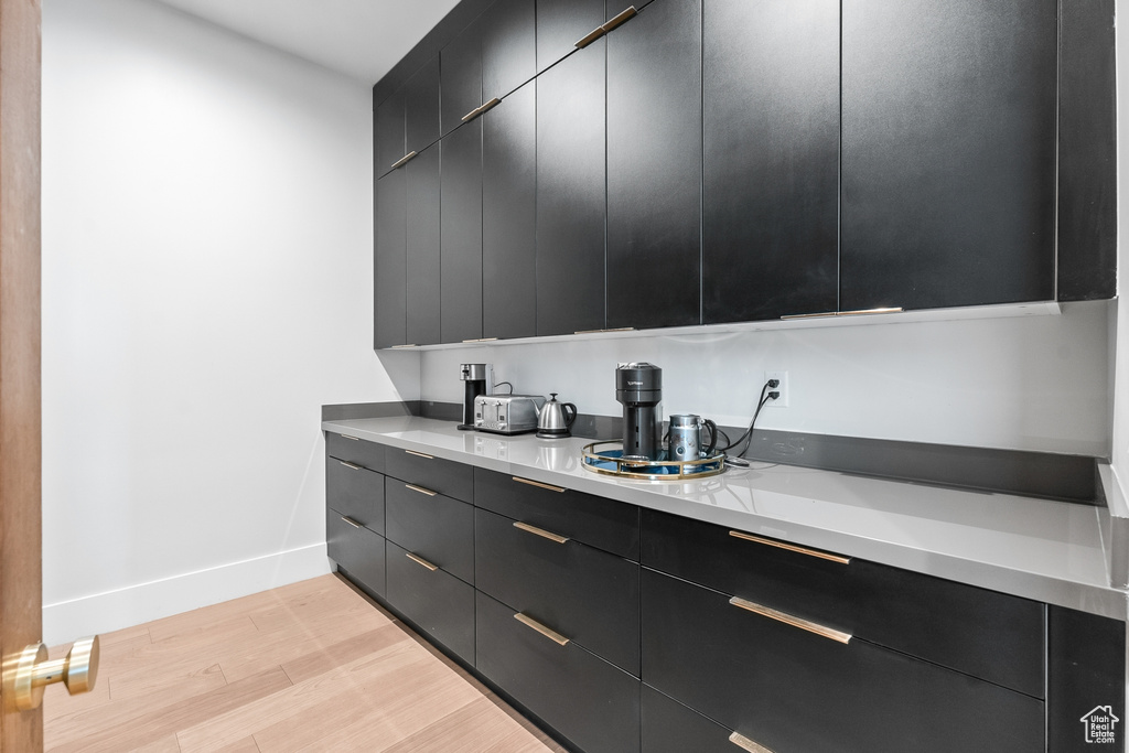 Kitchen with light wood-type flooring