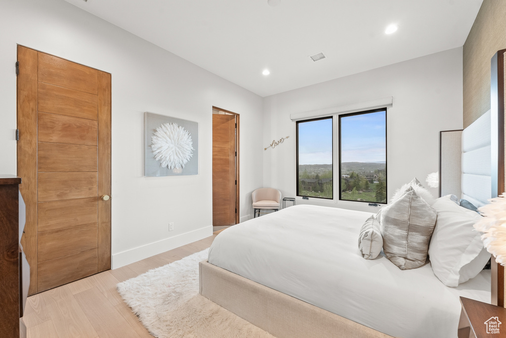 Bedroom featuring light hardwood / wood-style floors