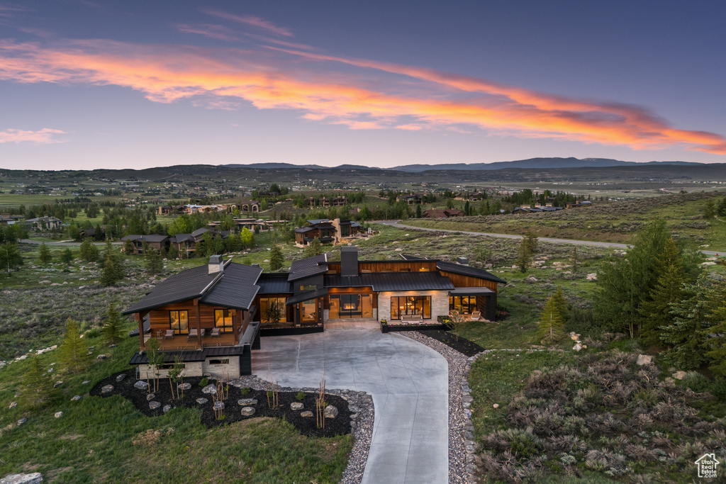 Aerial view at dusk with a mountain view