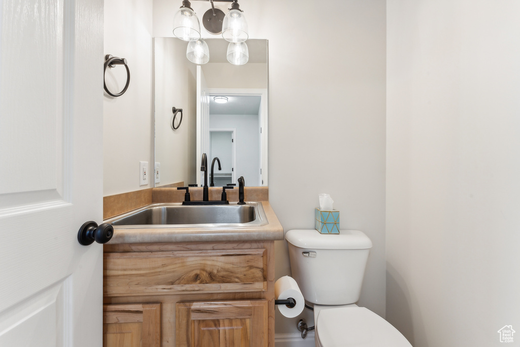 Bathroom with vanity and toilet