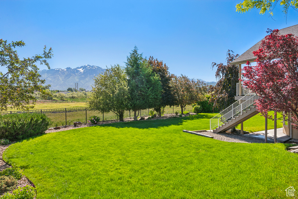 View of yard with a mountain view