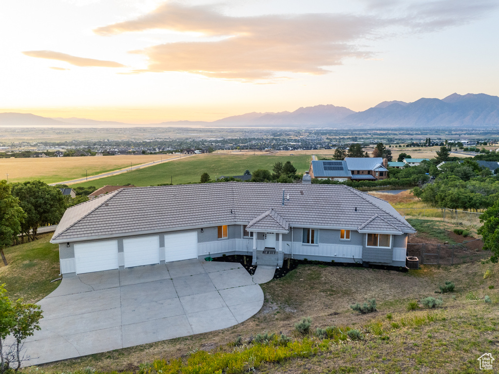 Aerial view at dusk with a mountain view