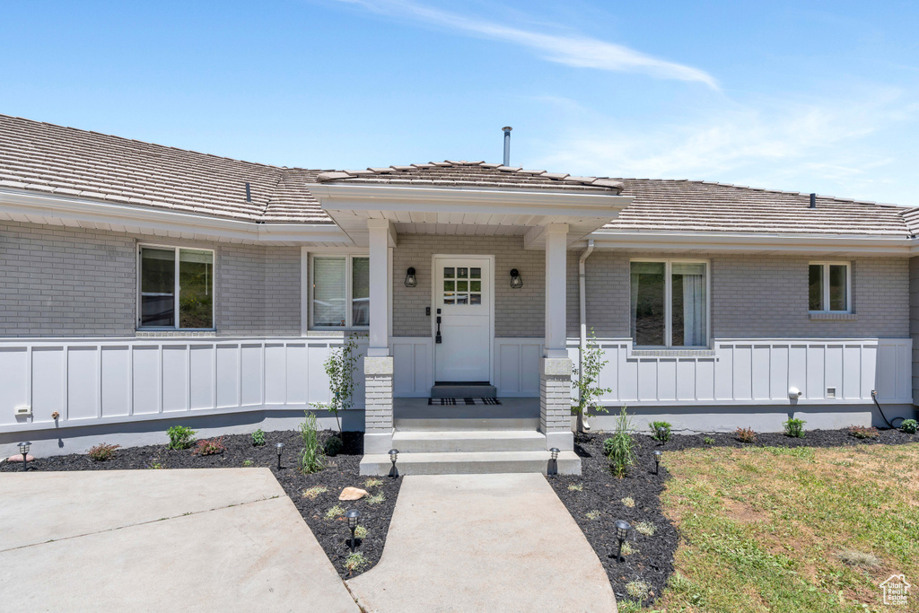 View of front of property with covered porch