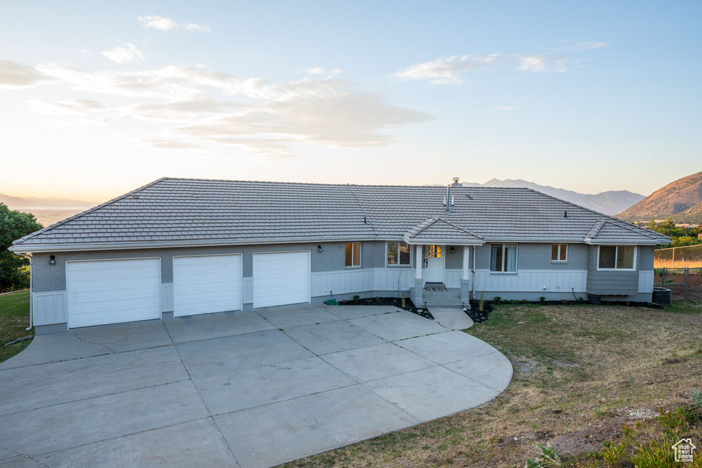 View of front of property featuring central AC