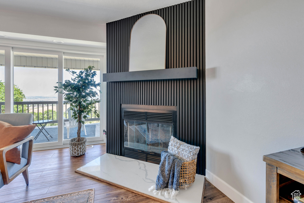 Living room with wood-type flooring