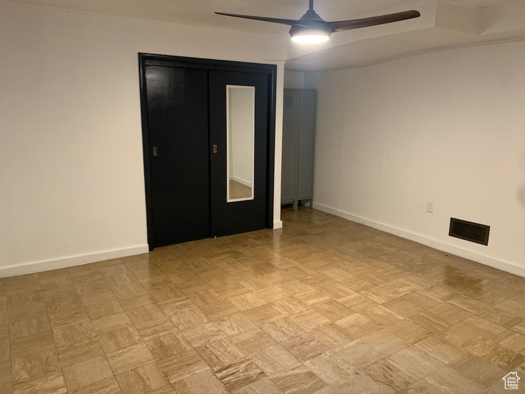 Unfurnished bedroom with ceiling fan