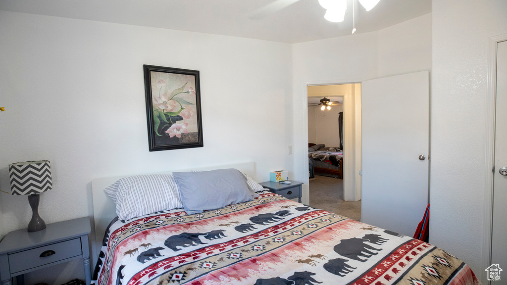 Bedroom with carpet and ceiling fan