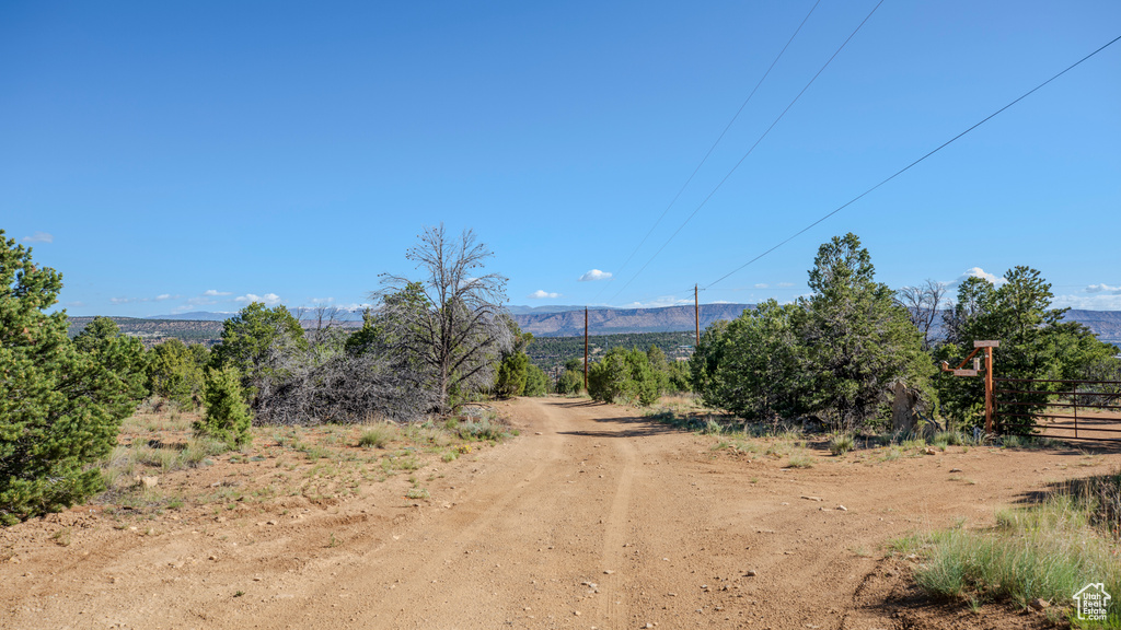 View of road featuring a mountain view and a rural view