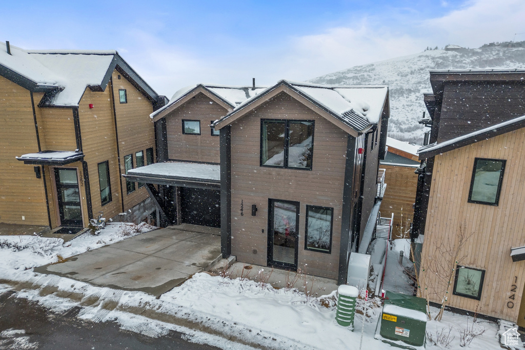 View of front of home with a mountain view