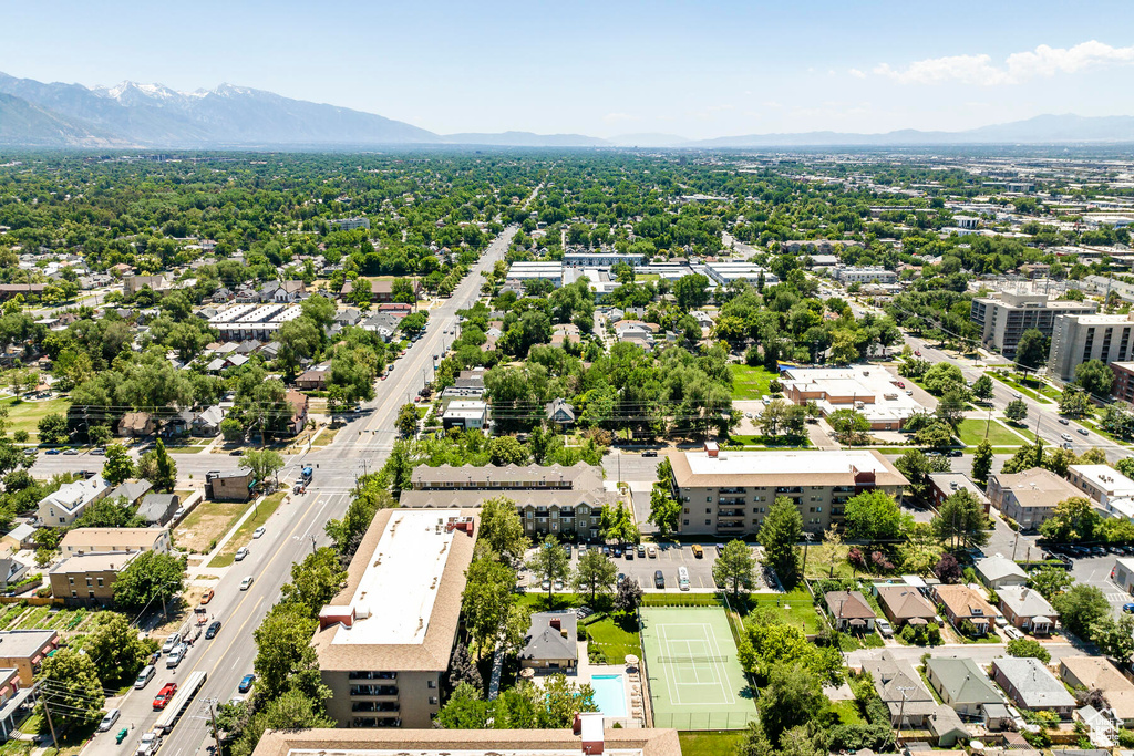 Birds eye view of property featuring a mountain view