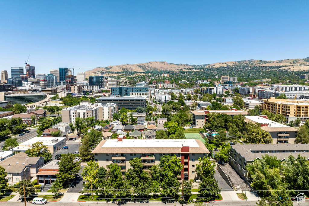 Birds eye view of property with a mountain view