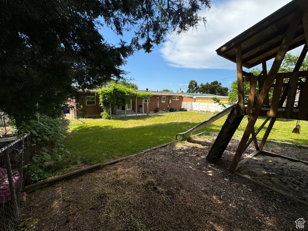 View of yard with a playground