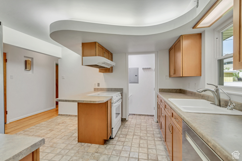 Kitchen featuring light tile flooring, dishwasher, a kitchen breakfast bar, electric range, and sink