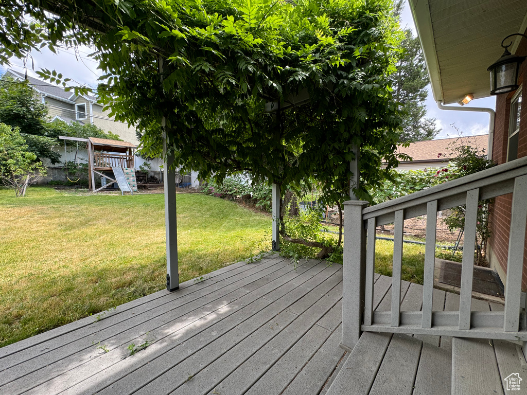 Wooden deck with a yard