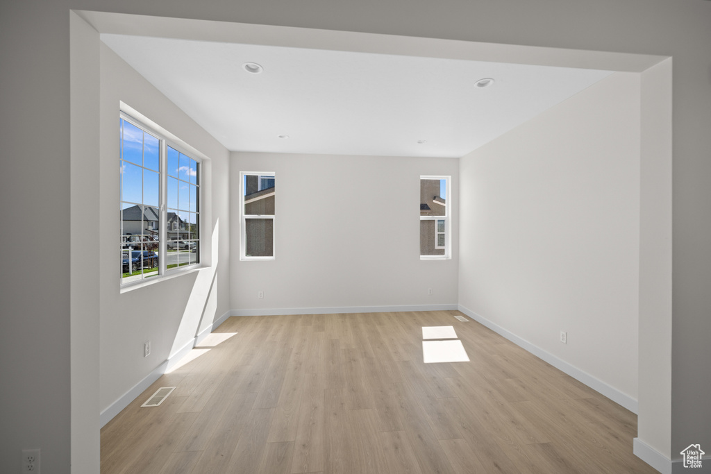 Unfurnished room featuring light hardwood / wood-style floors