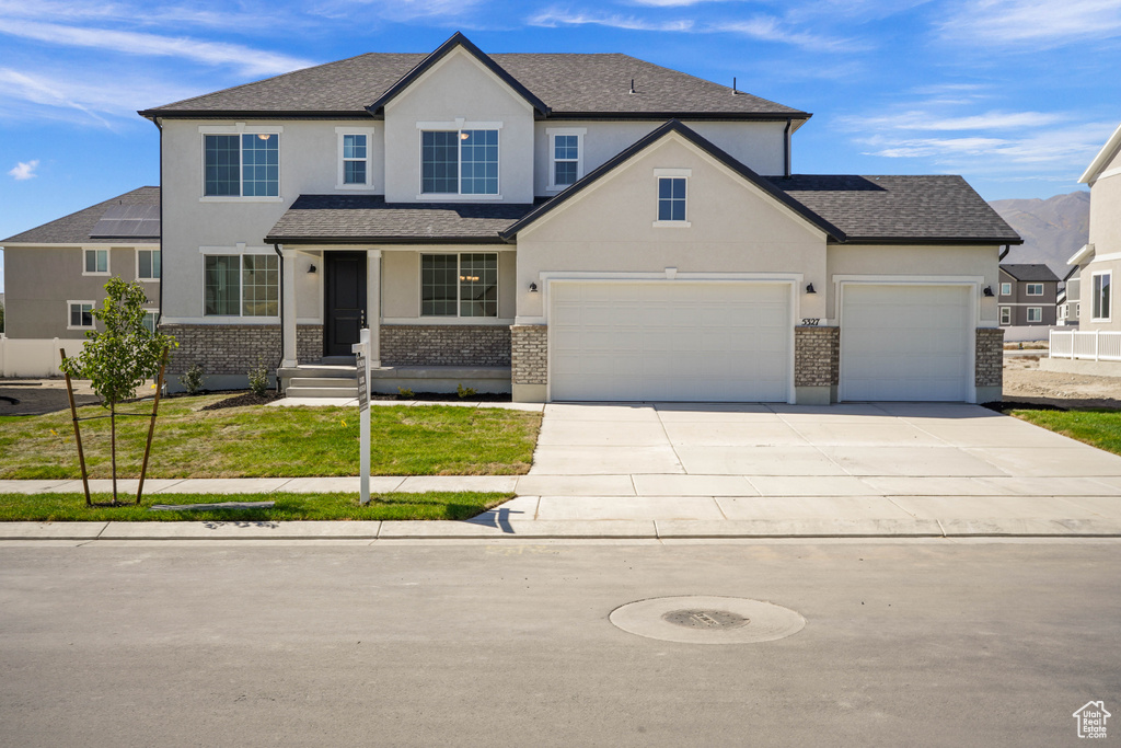 View of front of home with a front yard