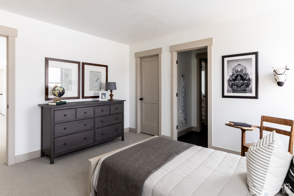 Bedroom featuring carpet flooring