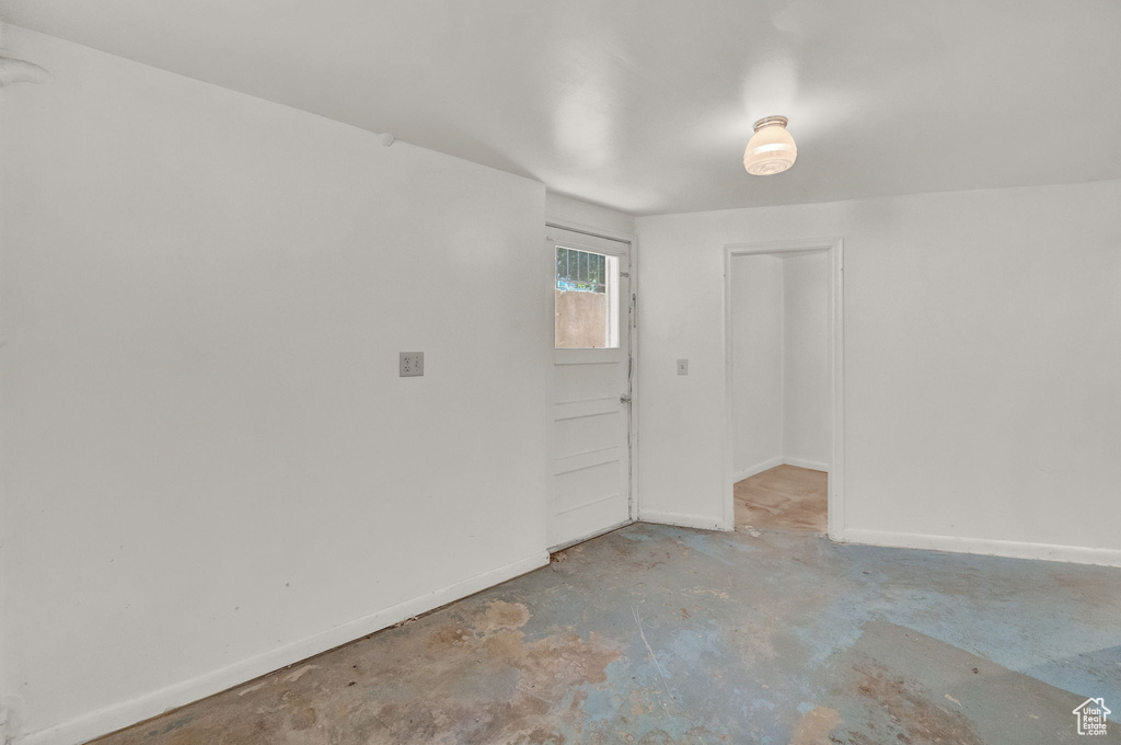 Spare room with concrete floors