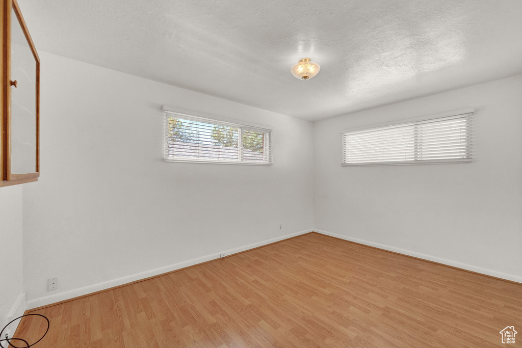 Unfurnished room featuring light hardwood / wood-style floors