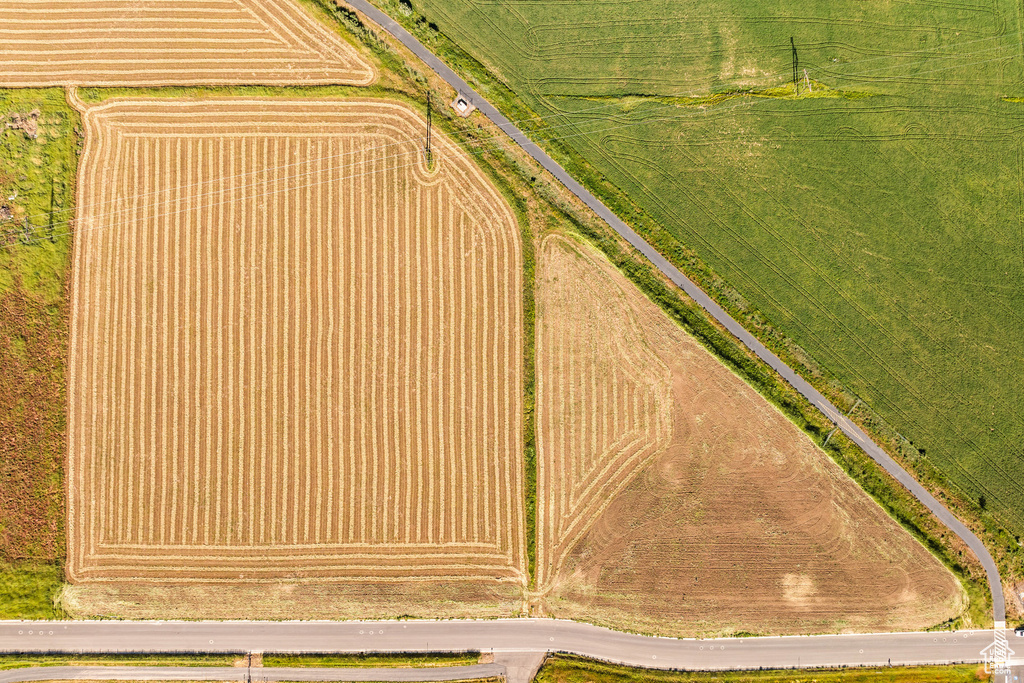 Birds eye view of property featuring a rural view