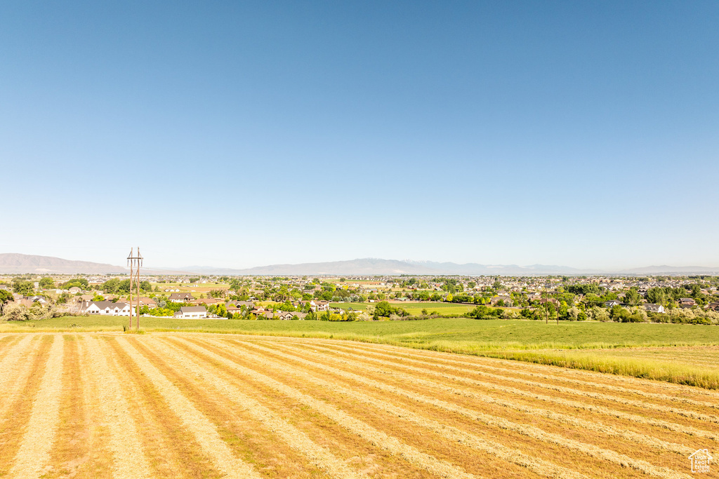 View of yard featuring a mountain view and a rural view