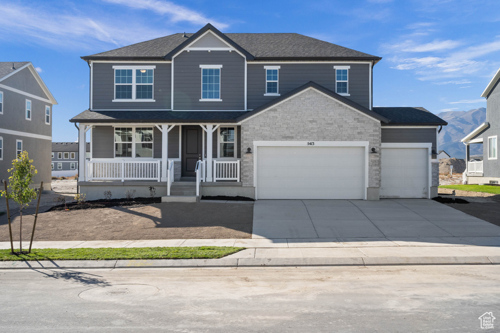 View of front of property featuring a porch