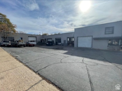 View of property with a garage