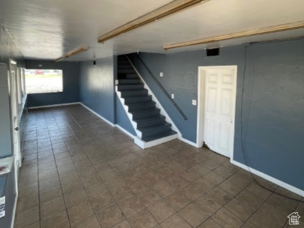 Interior space with dark tile flooring