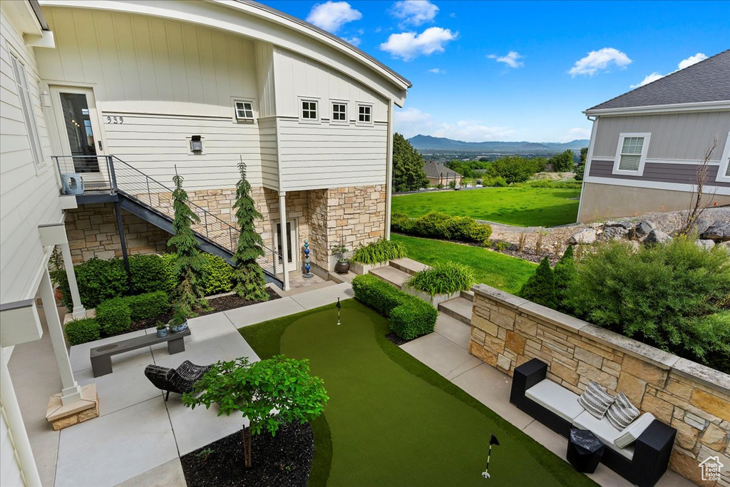 View of terrace with a mountain view