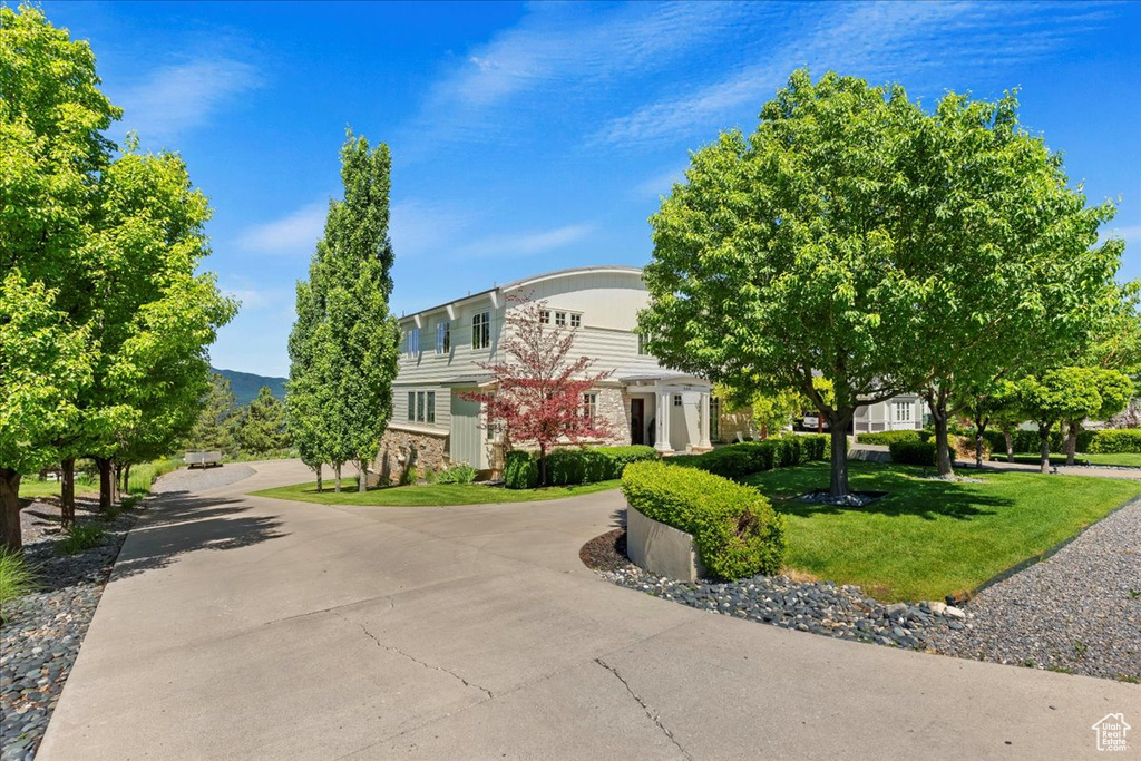 View of front of house with a front yard