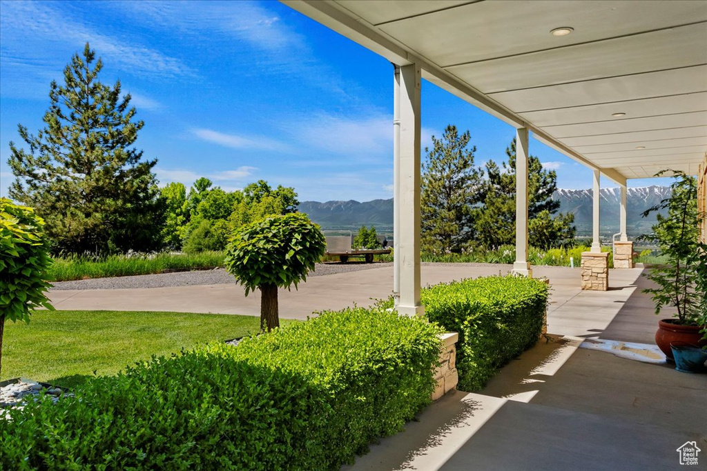 View of terrace featuring a mountain view