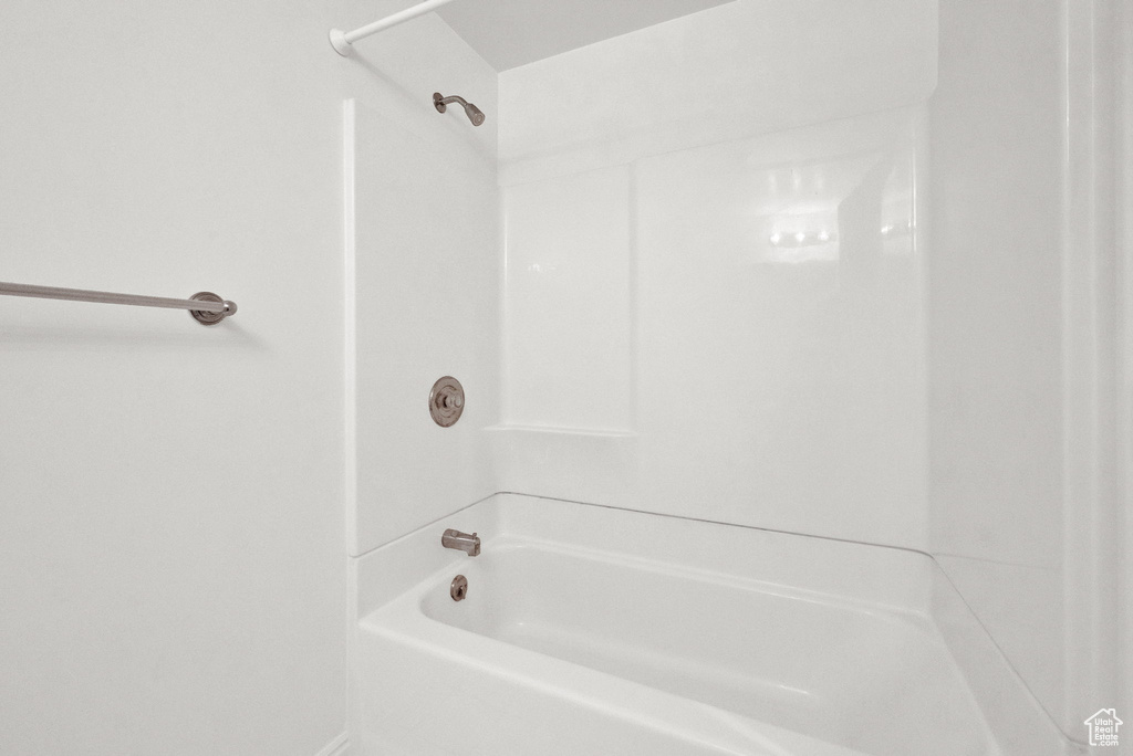 Bathroom with shower / washtub combination