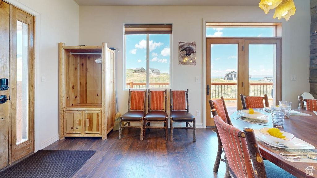 Dining area featuring dark hardwood / wood-style flooring