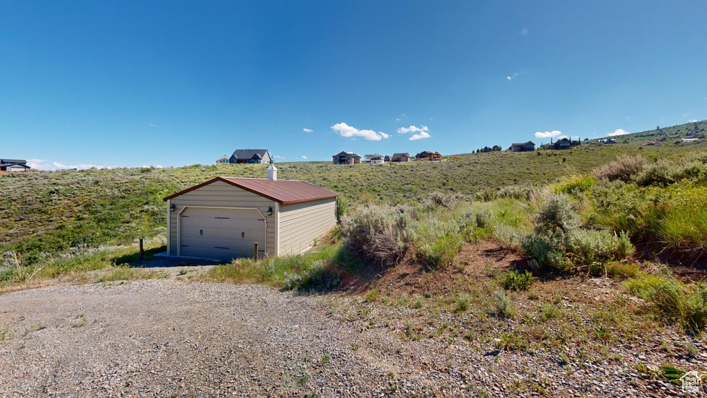 Garage featuring a rural view