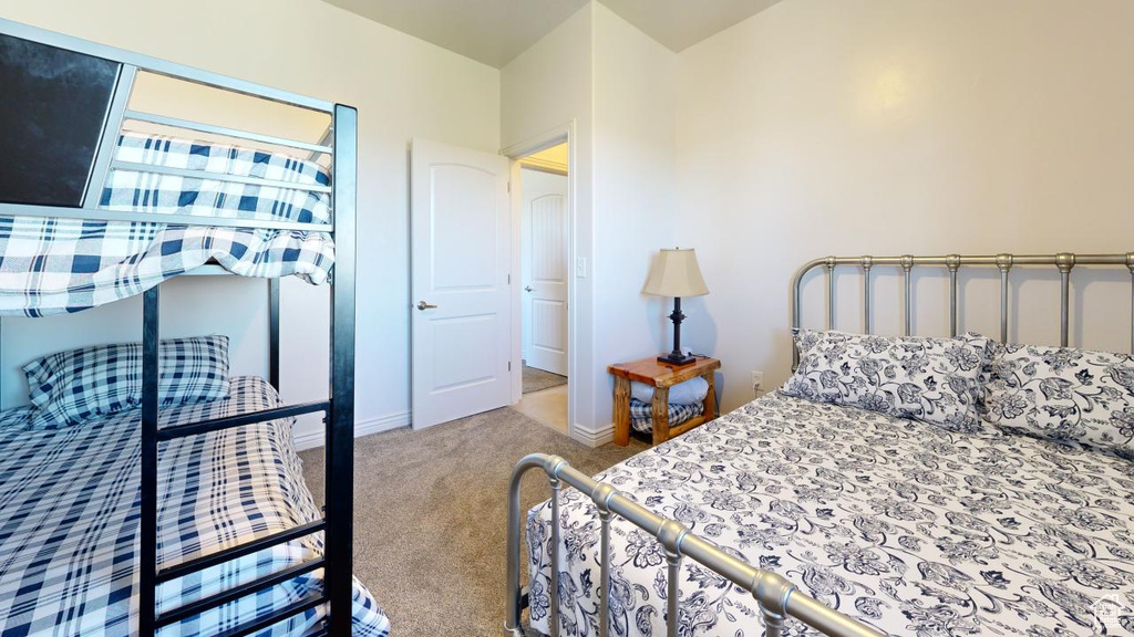 Bedroom featuring carpet flooring