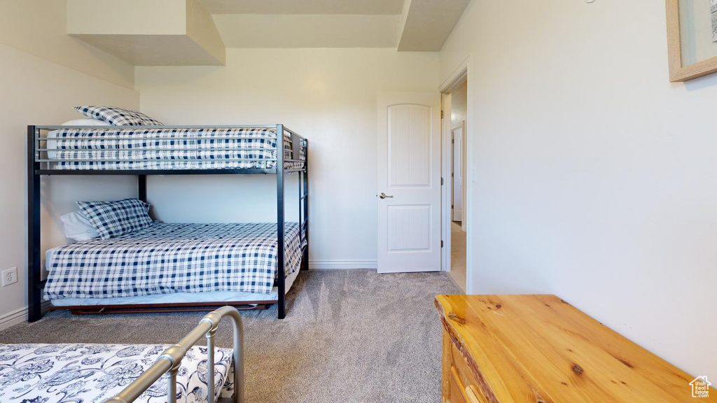 Bedroom featuring carpet flooring