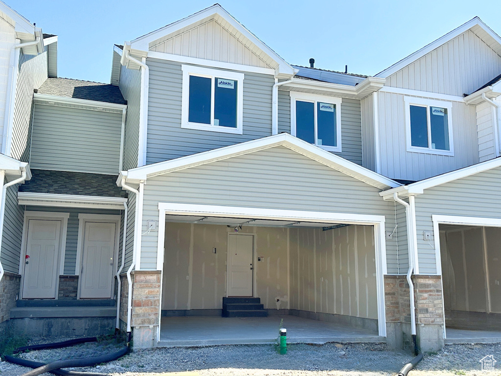 View of front of property with a garage