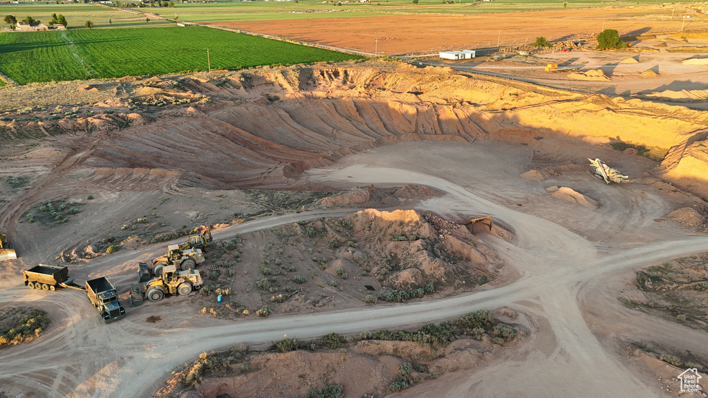 Birds eye view of property with a rural view