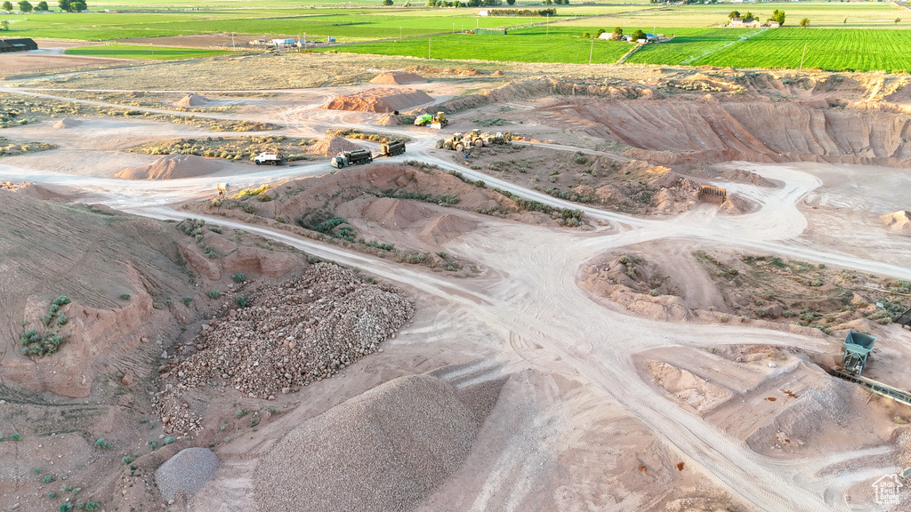 Birds eye view of property with a rural view