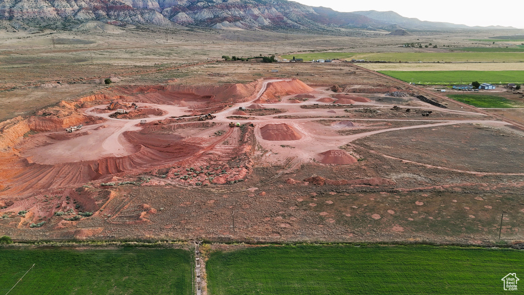 Drone / aerial view with a mountain view and a rural view