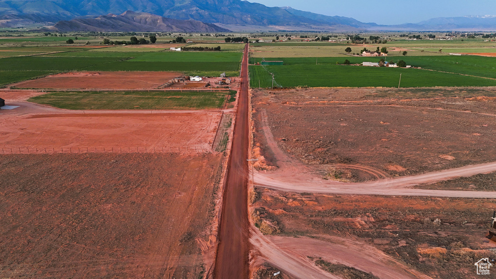 Birds eye view of property featuring a mountain view and a rural view