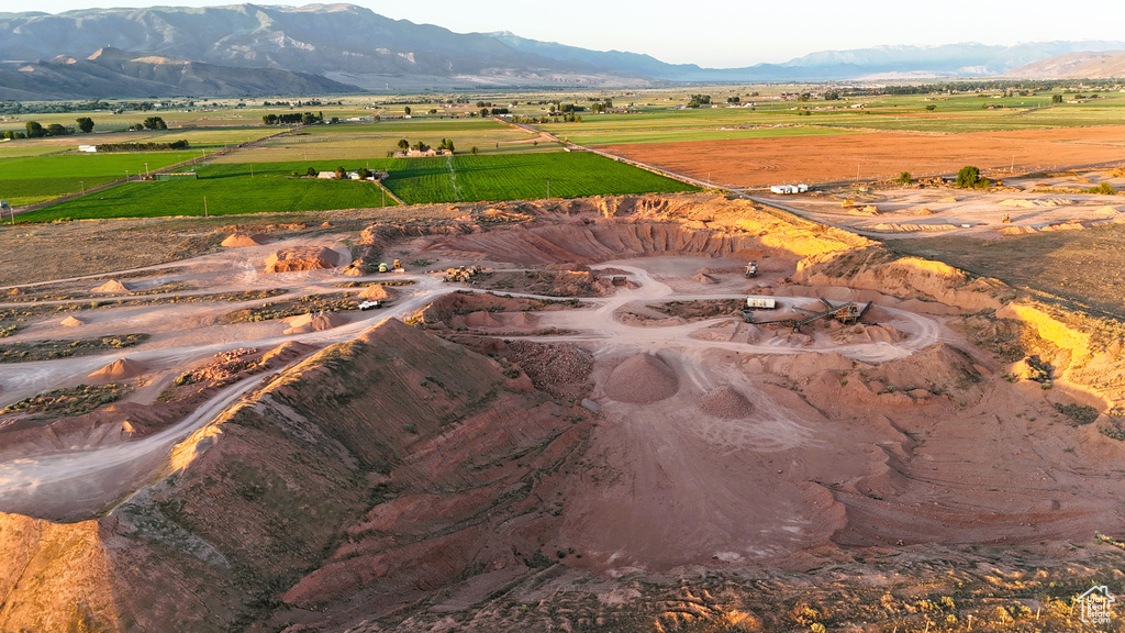 Aerial view featuring a rural view and a mountain view