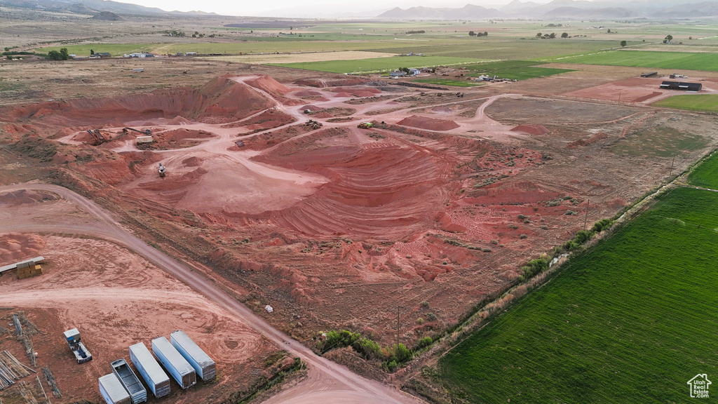 Birds eye view of property with a rural view