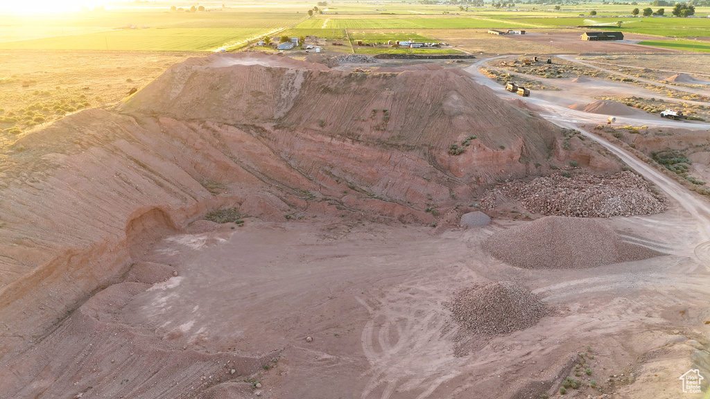 Aerial view at dusk featuring a rural view