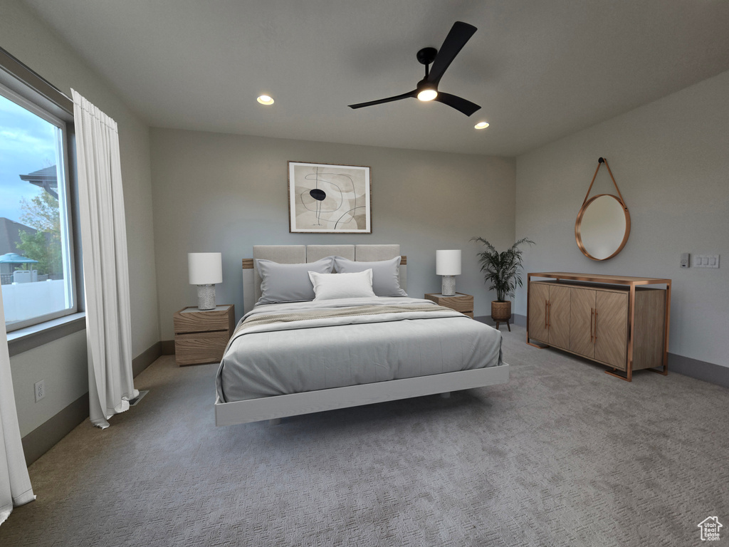 Carpeted bedroom with ceiling fan