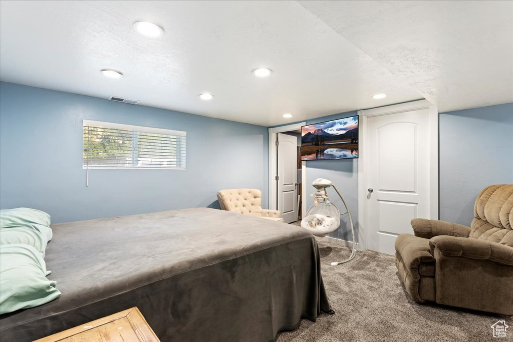 Bedroom featuring carpet flooring