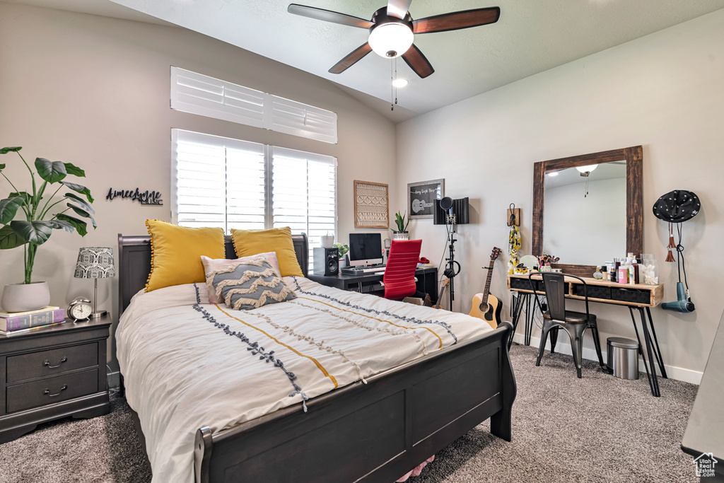 Bedroom with carpet and ceiling fan