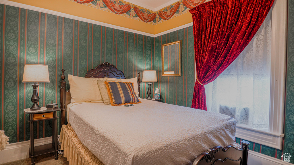 Bedroom with ornamental molding